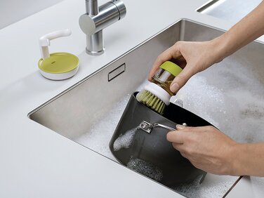 Щетка для мытья посуды с дозатором моющего средства серая Palm Scrub Joseph Joseph